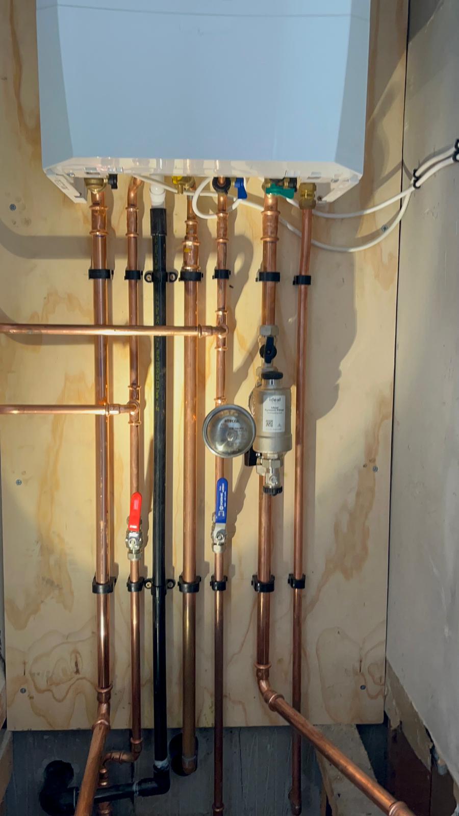 Boiler pipework with isolation valves and system filter installation